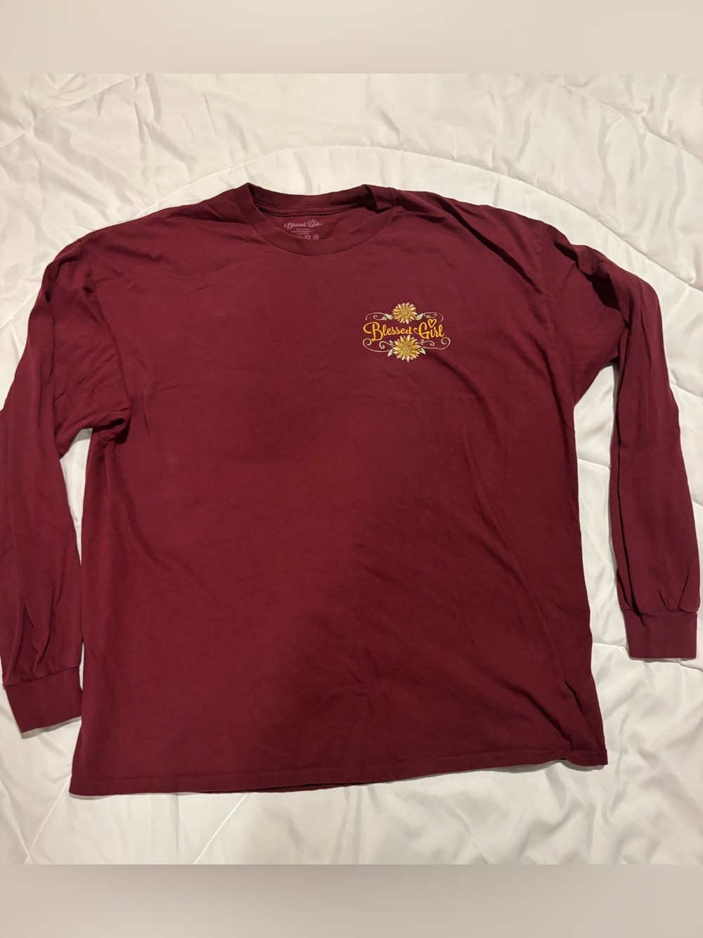 Blessed Girl Maroon Long Sleeve Graphic Tee “consider how the wild flowers grow.